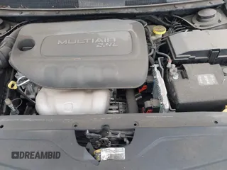 2015 Chrysler 200 Limited with VIN 1C3CCCABXFN709136, listed as a IAAI auction lot 40913236 with 100,774 mi miles and . Bid and sale history available at DreamBid. Image 10.