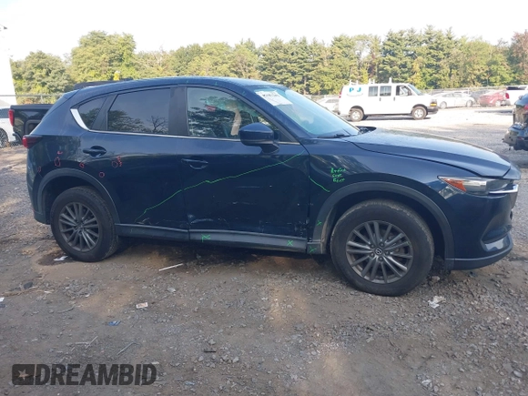 2017 Mazda CX-5 Touring with VIN JM3KFBCL6H0170455, listed as a IAAI auction lot 40381242 with 71,520 mi miles. Bid and sale history available at carsss.com. Image 13.