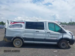 2016 Ford Transit Cargo with VIN 1FTYE1ZM9GKB17364, listed as a IAAI auction lot 42702871 with 142,000 mi miles and . Bid and sale history available at DreamBid. Image 13.