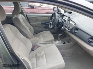 2010 Honda Insight EX with VIN JHMZE2H7XAS024879, listed as a IAAI auction lot 42029553 with 187,648 mi miles. Bid and sale history available at carsss.com. Image 5.