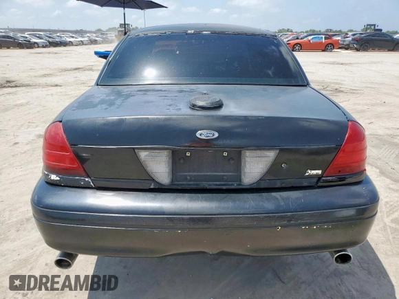 2010 Ford Police Interceptor with VIN 2FABP7BV9AX110091, listed as a Copart auction lot 60065205 with Not provided miles and Salvage title. Bid and sale history available at DreamBid. Image 6.