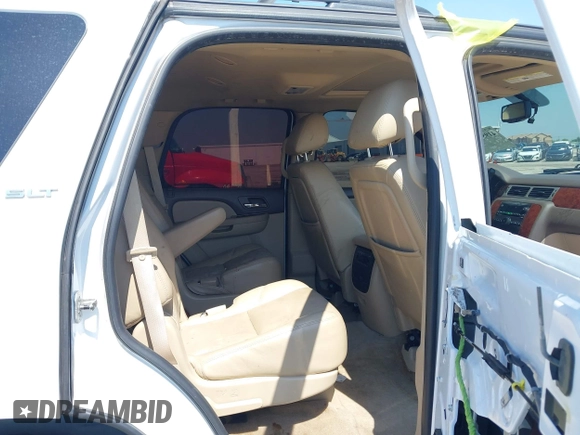 2011 GMC Yukon SLT z VIN 1GKS1CE00BR210794, wystawiony jako IAAI lot #41958998 z przebiegiem 225 407 mil mil oraz . Historia ofert i sprzedaży dostępna na DreamBid. Obrazek 8.