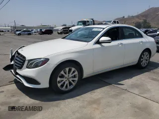 2018 Mercedes-Benz E 300 with VIN WDDZF4JB2JA305398, listed as a Copart auction lot 59123975 with 48,029 mi miles and Salvage title. Bid and sale history available at DreamBid. Image 1.