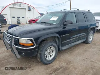 2001 Dodge Durango with VIN 1B4HS28Z71F512653, listed as a IAAI auction lot 41816026 with 193,935 mi miles and . Bid and sale history available at DreamBid. Image 2.