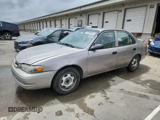1999 Toyota Corolla VE with VIN 2T1BR12E1XC137266, listed as a Copart auction lot 60986955 with 222,566 mi miles and Salvage title. Bid and sale history available at DreamBid. Image 1.