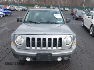 2014 Jeep Patriot Latitude with VIN 1C4NJRFB6ED778433, listed as a IAAI auction lot 41211522 with 127,506 mi miles. Bid and sale history available at carsss.com. Image 12.