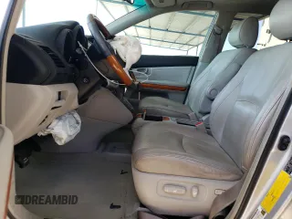 2009 Lexus RX 350 with VIN 2T2HK31U69C122392, listed as a Copart auction lot 52439995 with 185,463 mi miles and Salvage Title. Bid and sale history available at DreamBid. Image 7.