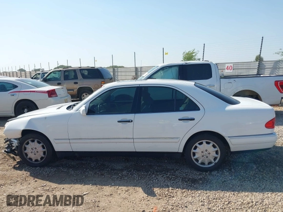 1999 Mercedes-Benz E-Class with VIN WDBJF65H6XA867166, listed as a IAAI auction lot 42017341 with 89,841 mi miles. Bid and sale history available at carsss.com. Image 14.