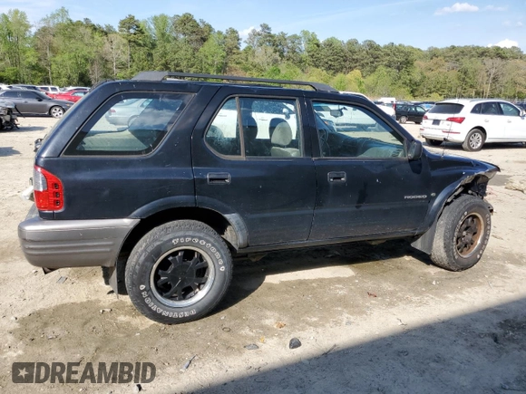 2000 Isuzu Rodeo S with VIN 4S2CK58W7Y4309261, listed as a Copart auction lot 54000775 with 187,949 mi miles and Salvage title. Bid and sale history available at DreamBid. Image 3.