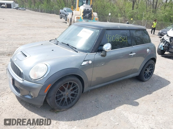 2007 MINI Hardtop S with VIN WMWMF73567TT82315, listed as a IAAI auction lot 42081321 with 123,072 mi miles and . Bid and sale history available at DreamBid. Image 2.