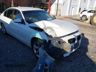 2014 BMW 3 Series 320i with VIN WBA3B1C58EP679225, listed as a IAAI auction lot 42151136 with 135,459 mi miles and . Bid and sale history available at DreamBid. Image 1.