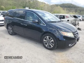 2016 Honda Odyssey Touring Elite with VIN 5FNRL5H97GB038917, listed as a Copart auction lot 54479375 with 165,432 mi miles and Salvage Title. Bid and sale history available at DreamBid. Image 4.