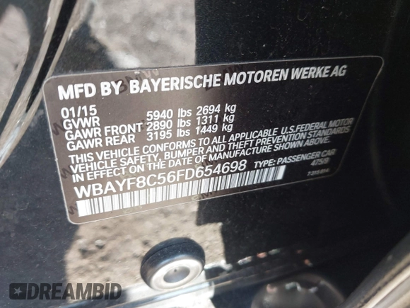 2015 BMW 7 Series 750Li xDrive with VIN WBAYF8C56FD654698, listed as a IAAI auction lot 41229313 with 120,238 mi miles and . Bid and sale history available at carsss.com. Image 9.
