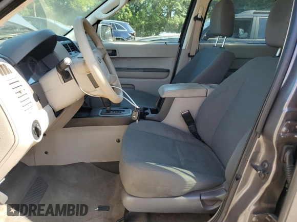 2009 Ford Escape XLS with VIN 1FMCU02749KA36136, listed as a Copart auction lot 64941875 with 171,576 mi miles and Clean title. Bid and sale history available at DreamBid. Image 7.