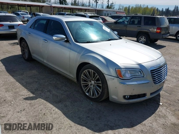 2012 Chrysler 300 with VIN 2C3CCAET2CH207796, listed as a IAAI auction lot 42029639 with 142,929 mi miles. Bid and sale history available at carsss.com. Image 1.