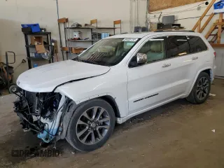 2017 Jeep Grand Cherokee Overland with VIN 1C4RJFCG8HC809868, listed as a Copart auction lot 64056155 with 54,136 mi miles and Salvage title. Bid and sale history available at DreamBid. Image 1.