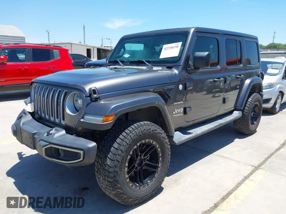 2018 Jeep Wrangler Unlimited Sahara with VIN 1C4HJXEN1JW236779, listed as a IAAI auction lot 42238158 with 72,879 mi miles and . Bid and sale history available at DreamBid. Image 18.