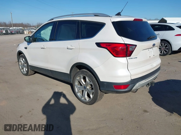 2019 Ford Escape Titanium with VIN 1FMCU9J91KUB21842, listed as a IAAI auction lot 41632210 with 104,900 mi miles. Bid and sale history available at carsss.com. Image 3.