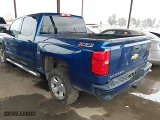 2016 Chevrolet Silverado 1500 LT with VIN 3GCUKREC6GG266485, listed as a IAAI auction lot 41720514 with 105,464 mi miles. Bid and sale history available at carsss.com. Image 3.