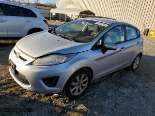 2012 Ford Fiesta SE with VIN 3FADP4EJ3CM194231, listed as a Copart auction lot 48000555 with 142,666 mi miles and Salvage Title. Bid and sale history available at carsss.com. Image 1.