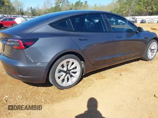 2022 Tesla Model 3 Long Range with VIN 5YJ3E1EB3NF309632, listed as a IAAI auction lot 41808987 with Not Provided miles and . Bid and sale history available at DreamBid. Image 4.