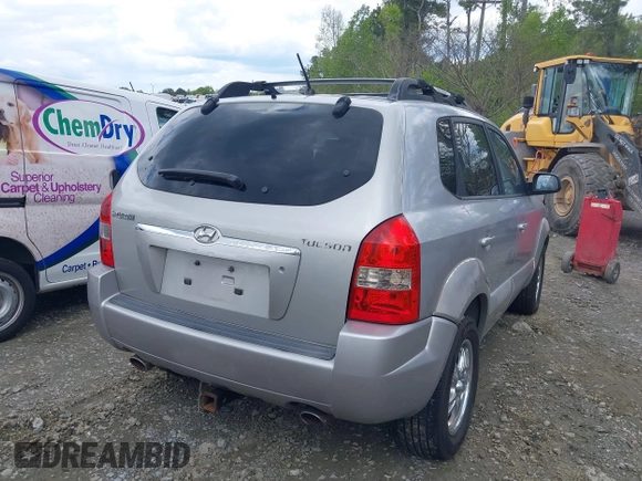 2006 Hyundai Tucson GLS with VIN KM8JN12D66U265210, listed as a IAAI auction lot 42024756 with 133,557 mi miles. Bid and sale history available at carsss.com. Image 4.