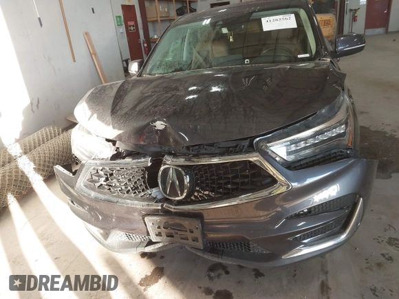 2021 Acura RDX w/Advance Package with VIN 5J8TC2H76ML031020, listed as a IAAI auction lot 41282562 with 35,454 mi miles. Bid and sale history available at carsss.com. Image 6.