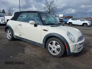 2006 MINI Convertible with VIN WMWRF33566TF65410, listed as a IAAI auction lot 40813052 with 131,109 mi miles and . Bid and sale history available at DreamBid. Image 1.