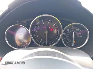 2023 Mazda MX-5 Miata Grand Touring z VIN JM1NDAM73P0561844, wystawiony jako IAAI lot #42195198 z przebiegiem 6 020 mil mil oraz . Historia ofert i sprzedaży dostępna na DreamBid. Obrazek 7.