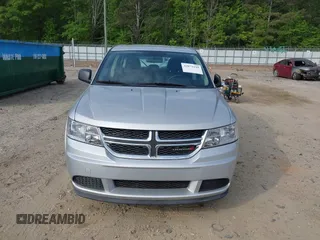 2014 Dodge Journey SE with VIN 3C4PDCAB0ET139916, listed as a IAAI auction lot 42072199 with 92,591 mi miles and . Bid and sale history available at DreamBid. Image 6.
