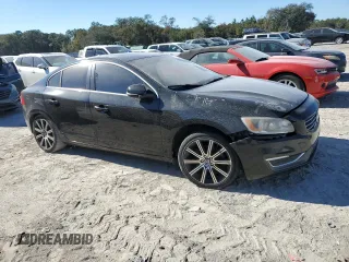 2015 Volvo S60 T5 Drive-E Platinum with VIN YV140MFD6F2301849, listed as a Copart auction lot 82231124 with Not Provided miles and Clean Title. Bid and sale history available at carsss.com. Image 4.