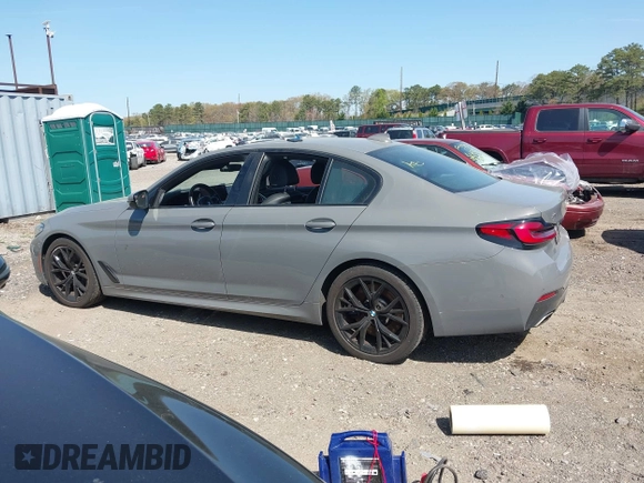 2021 BMW 5 Series 540i xDrive with VIN WBA73BJ03MWX30307, listed as a IAAI auction lot 41891615 with 27,374 mi miles and . Bid and sale history available at DreamBid. Image 14.