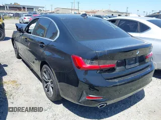 2021 BMW 3 Series 330i with VIN 3MW5R1J09M8C21377, listed as a IAAI auction lot 41892259 with Not Provided miles and . Bid and sale history available at carsss.com. Image 3.