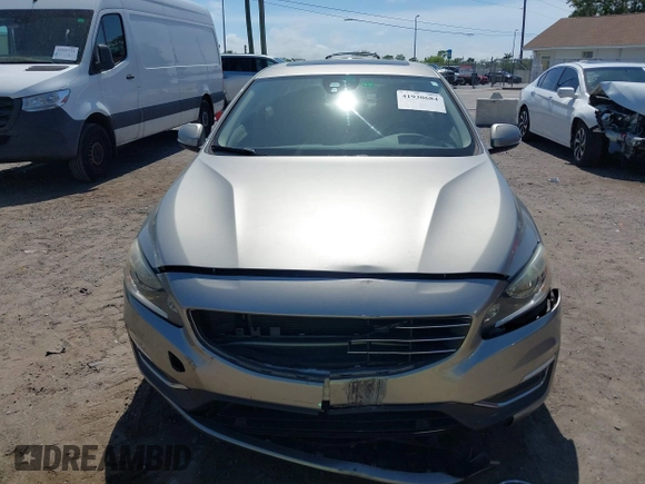 2015 Volvo S60 T5 Drive-E Premier Plus with VIN YV140MFC9F1318920, listed as a IAAI auction lot 41930684 with 66,790 mi miles. Bid and sale history available at carsss.com. Image 12.