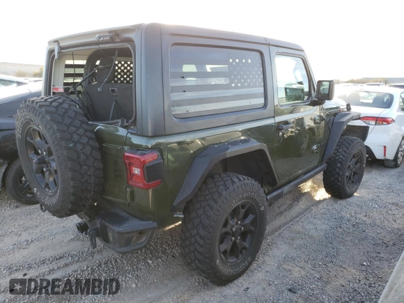 2021 Jeep Wrangler Sport S with VIN 1C4HJXAG6MW557583, listed as a Copart auction lot 88603685 with 28,325 mi miles and Salvage Title. Bid and sale history available at DreamBid. Image 3.