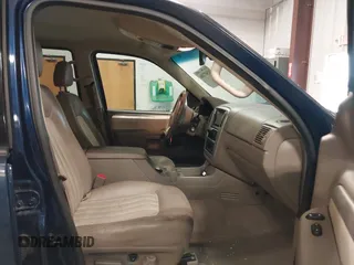 2005 Mercury Mountaineer with VIN 4M2ZU86E75ZJ27953, listed as a IAAI auction lot 41507206 with 185,291 mi miles and . Bid and sale history available at DreamBid. Image 5.