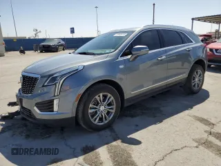2022 Cadillac XT5 AWD Premium Luxury with VIN 1GYKNDRS4NZ105689, listed as a Copart auction lot 52643515 with 63,042 mi miles and Salvage title. Bid and sale history available at DreamBid. Image 1.