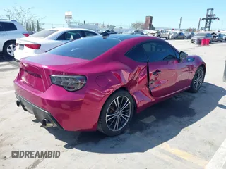 2016 Scion FR-S with VIN JF1ZNAA14G8709750, listed as a IAAI auction lot 41823702 with 74,828 mi miles and . Bid and sale history available at carsss.com. Image 4.