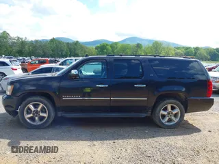 2011 Chevrolet Suburban LTZ with VIN 1GNSKKE38BR359006, listed as a IAAI auction lot 42183589 with 162,154 mi miles and . Bid and sale history available at DreamBid. Image 15.