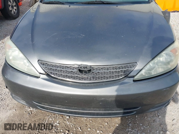 2003 Toyota Camry LE with VIN 4T1BE32K03U727447, listed as a IAAI auction lot 42118785 with 325,881 mi miles and . Bid and sale history available at DreamBid. Image 10.