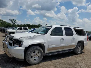 2011 Chevrolet Suburban LT with VIN 1GNSKJE35BR394032, listed as a Copart auction lot 59235184 with 248,979 mi miles and Salvage Title. Bid and sale history available at carsss.com. Image 1.