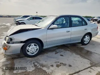 2002 Toyota Corolla CE with VIN 2T1BR12E02C580422, listed as a Copart auction lot 62932645 with 230,203 mi miles and Salvage title. Bid and sale history available at DreamBid. Image 1.