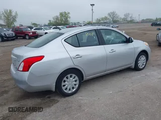 2012 Nissan Versa SV with VIN 3N1CN7AP5CL916413, listed as a IAAI auction lot 42184567 with 71,068 mi miles. Bid and sale history available at carsss.com. Image 4.