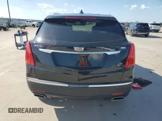 2019 Cadillac XT5 Premium Luxury FWD z VIN 1GYKNERS1KZ284355, wystawiony jako Copart lot #54150405 z przebiegiem 50 001 mil mil oraz Szkody całkowita. Historia ofert i sprzedaży dostępna na DreamBid. Obrazek 6.
