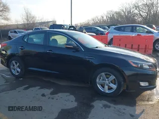 2015 Kia Optima LX with VIN 5XXGM4A70FG371690, listed as a IAAI auction lot 41884415 with 139,601 mi miles and . Bid and sale history available at DreamBid. Image 14.