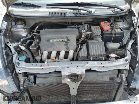 2007 Honda Fit z VIN JHMGD38427S021652, wystawiony jako Copart lot #52692775 z przebiegiem 178 416 mil mil oraz Szkoda całkowita • Salvage title. Historia ofert i sprzedaży dostępna na DreamBid. Obrazek 12.