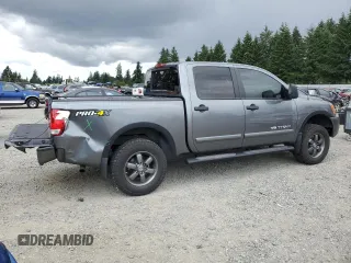 2015 Nissan Titan SV z VIN 1N6AA0EC5FN513631, wystawiony jako Copart lot #61260425 z przebiegiem 160 408 mil mil oraz Szkoda całkowita • Salvage title. Historia ofert i sprzedaży dostępna na DreamBid. Obrazek 3.