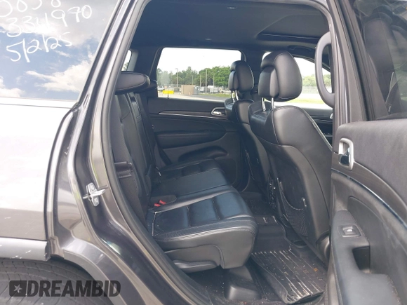 2018 Jeep Grand Cherokee Limited with VIN 1C4RJFBG2JC334970, listed as a IAAI auction lot 42346729 with 83,059 mi miles and . Bid and sale history available at DreamBid. Image 8.