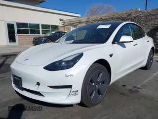 2023 Tesla Model 3 with VIN 5YJ3E1EA6PF411940, listed as a IAAI auction lot 41829537 with 32,877 mi miles and . Bid and sale history available at carsss.com. Image 21.