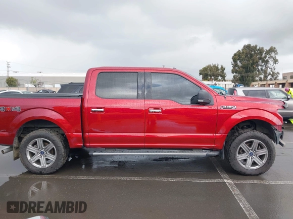 2015 Ford F-150 XLT with VIN 1FTEW1E89FFB76849, listed as a IAAI auction lot 41936016 with 107,773 mi miles and . Bid and sale history available at carsss.com. Image 14.